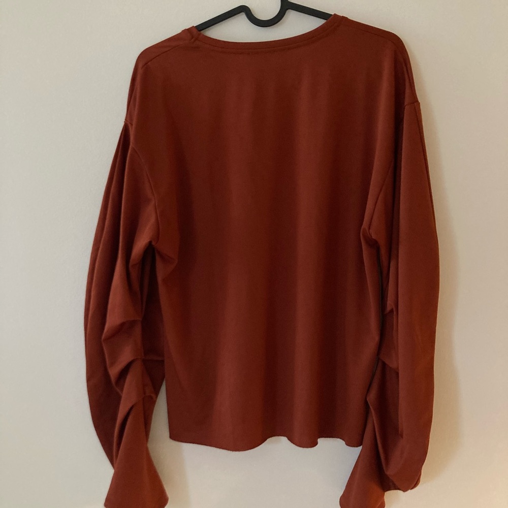 Orange Zara Trafaluc shirt with cinched sleeves